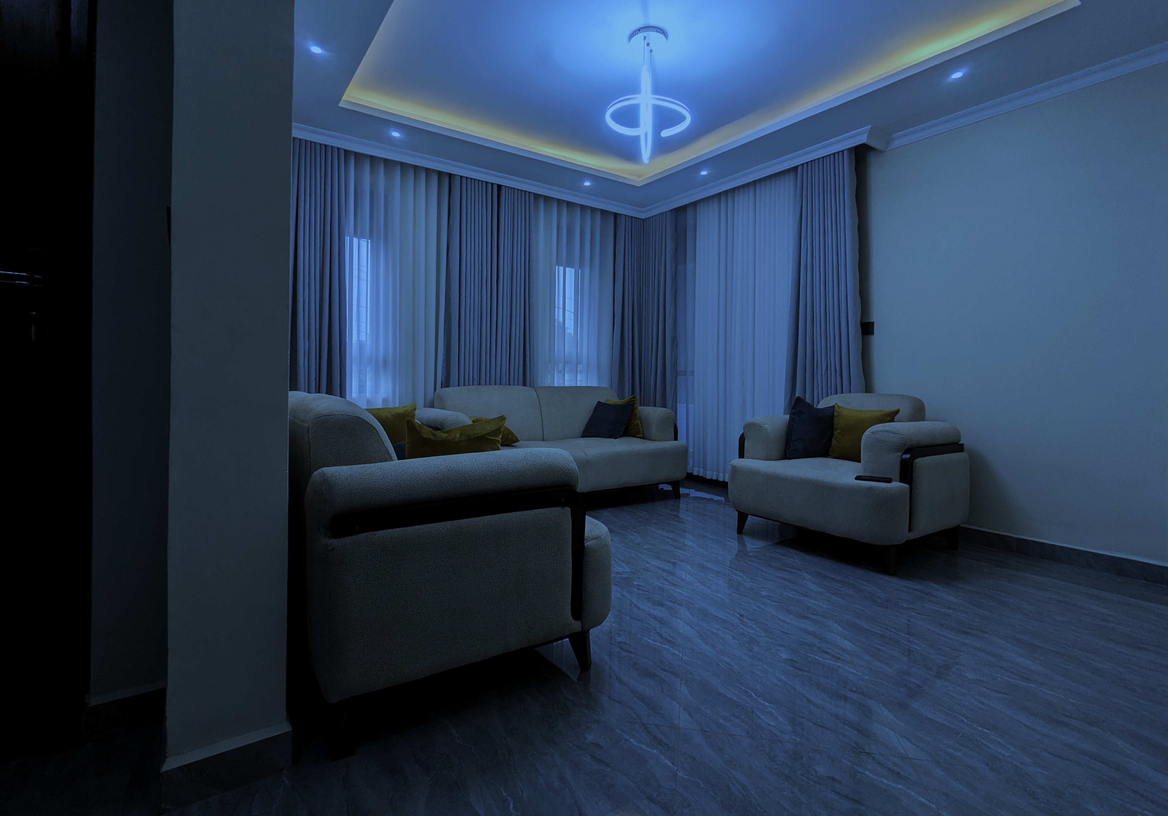 Elegant living room with modern furnishings at MEK Apartments